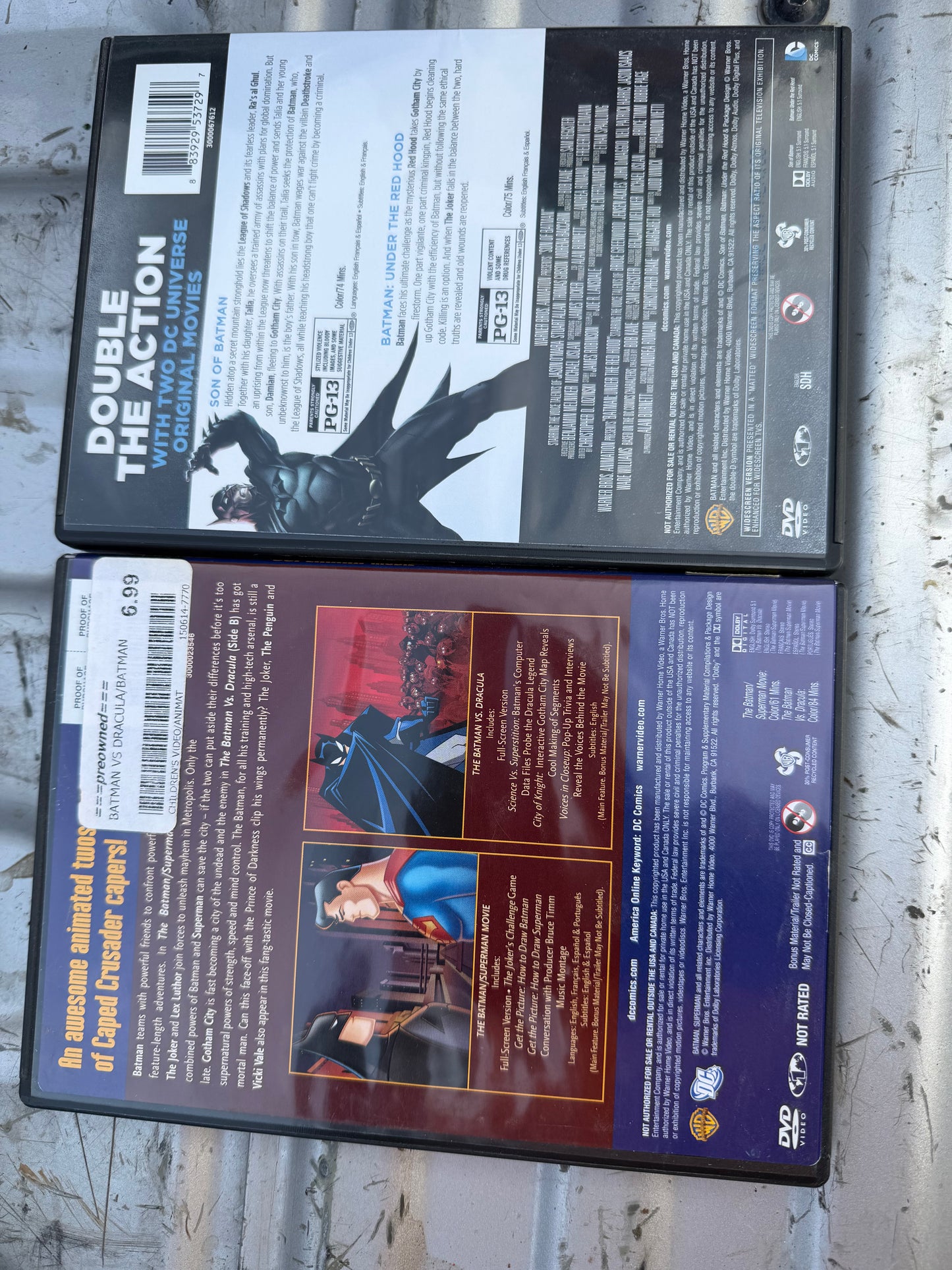 Batman animated movies DVD 2 cases 4 movie for one price Batman vs Dracula ,Batman vs Superman Son of Batman Batman under the Red Hood used…