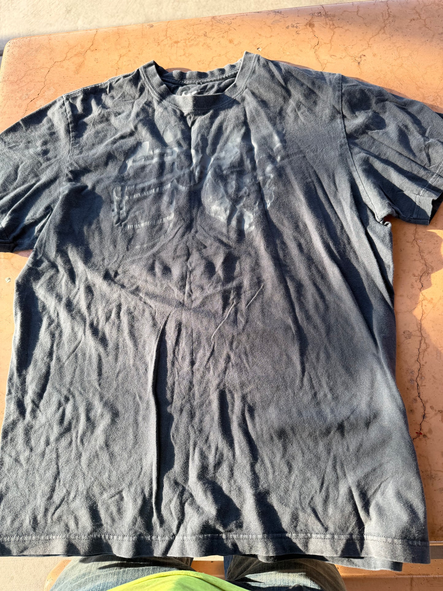 Nike tee shirt  gray with skull and football helmet on it size Large …