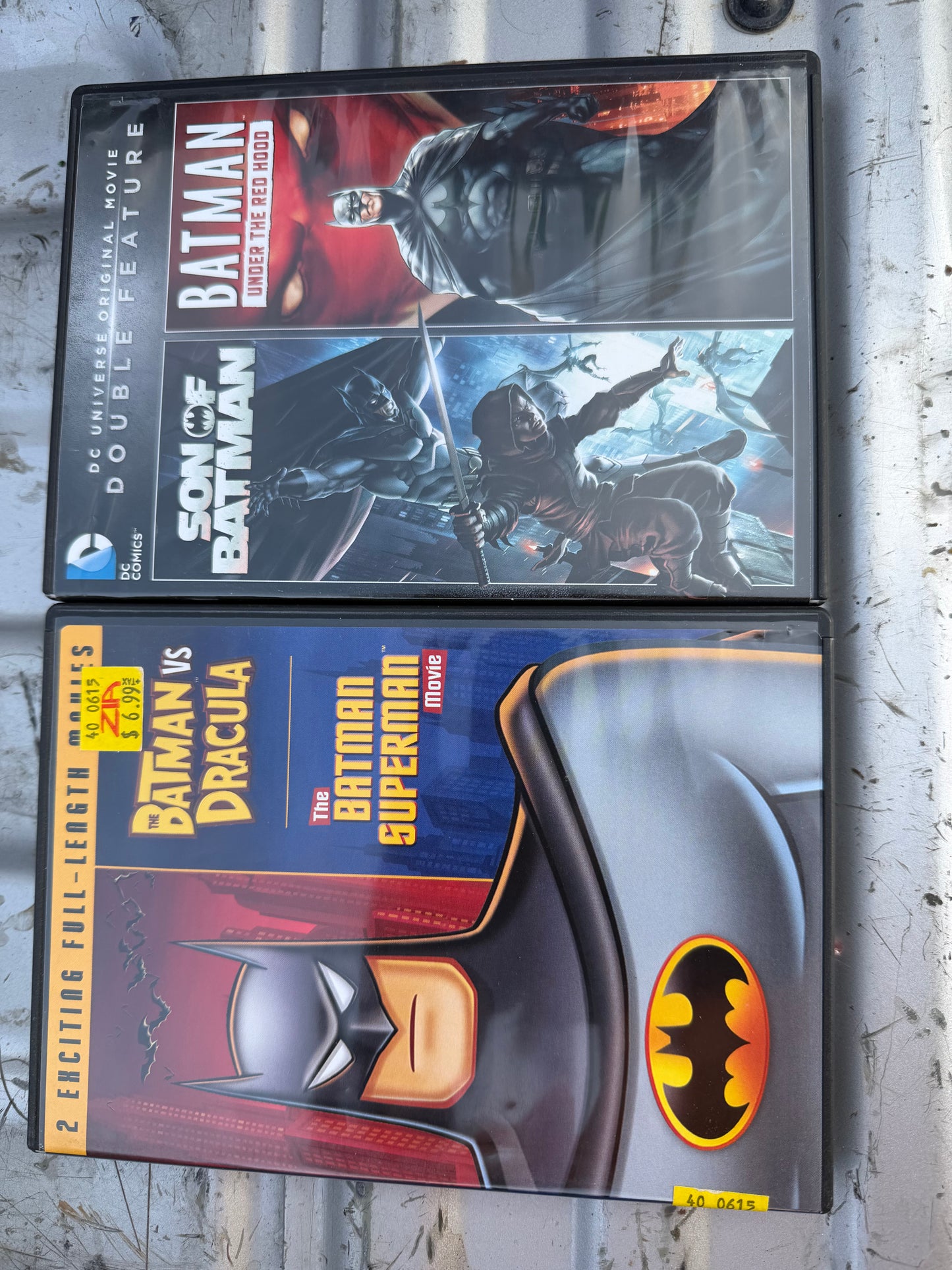 Batman animated movies DVD 2 cases 4 movie for one price Batman vs Dracula ,Batman vs Superman  Son of Batman Batman under the Red Hood used…