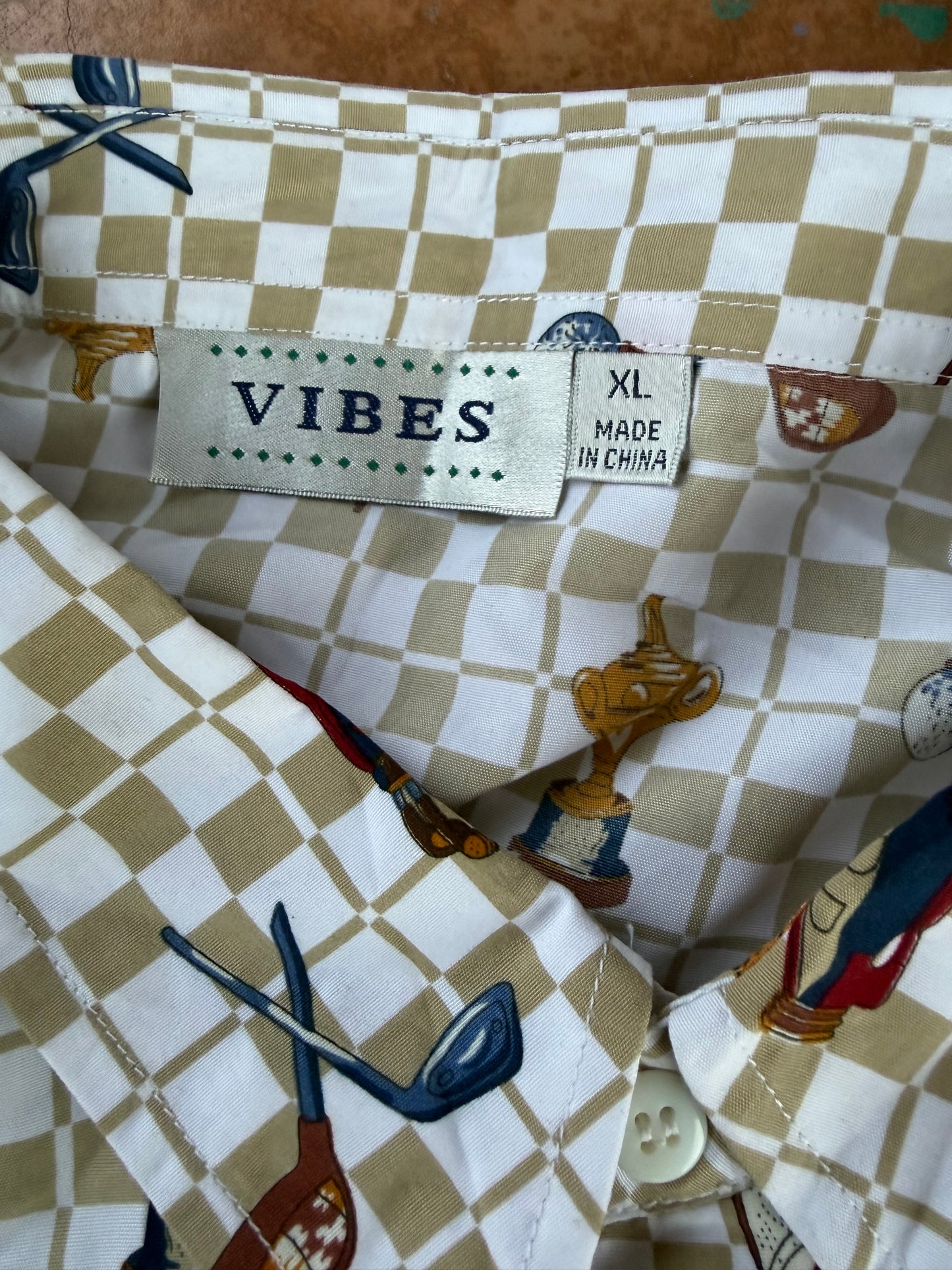 Vibes clothes button down Golfing dress up shirt size XL golf badges on shirt. Long sleeve light material polyester…