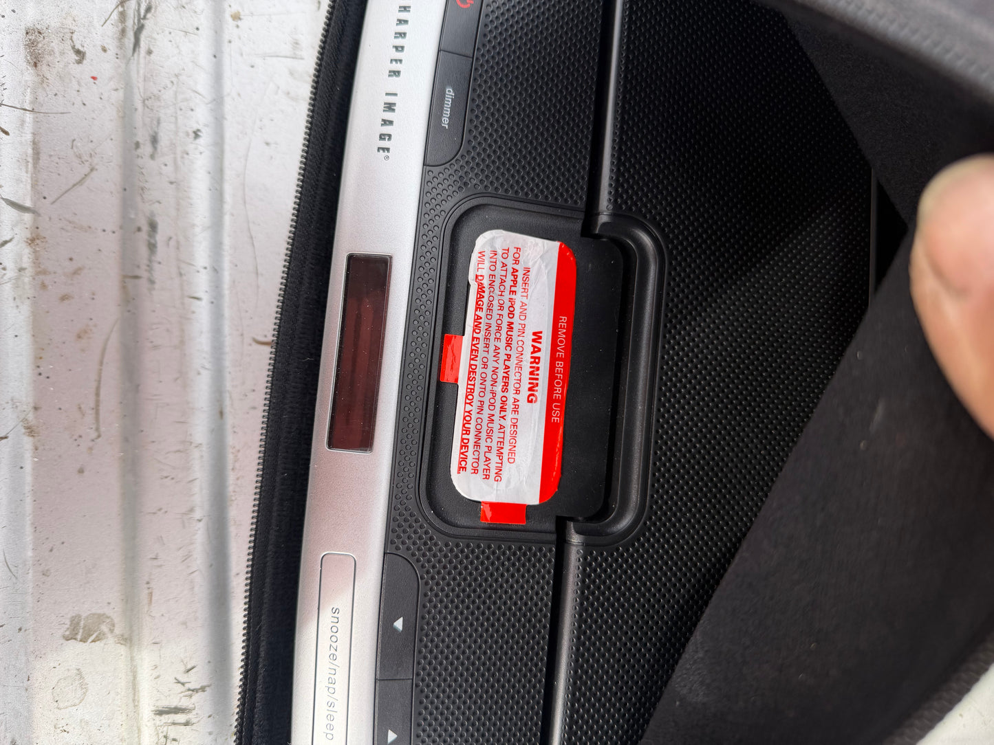 The Sharper Image docking for phone music. New with case …
