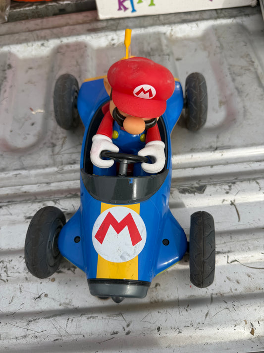 Mario’s car 10 inches long driving Mario’s cart. No battery…