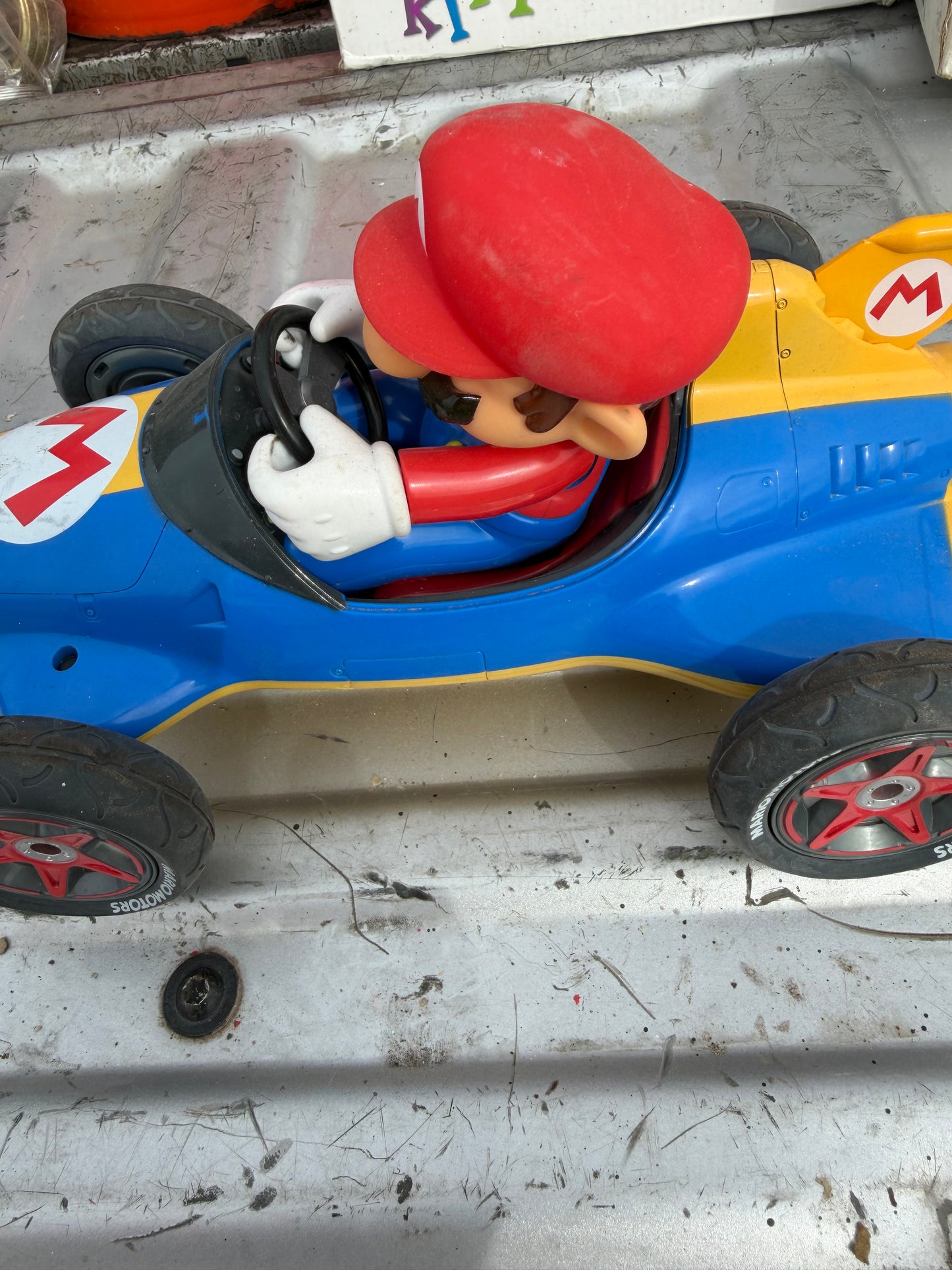 Mario’s car 10 inches long driving Mario’s cart. No battery…