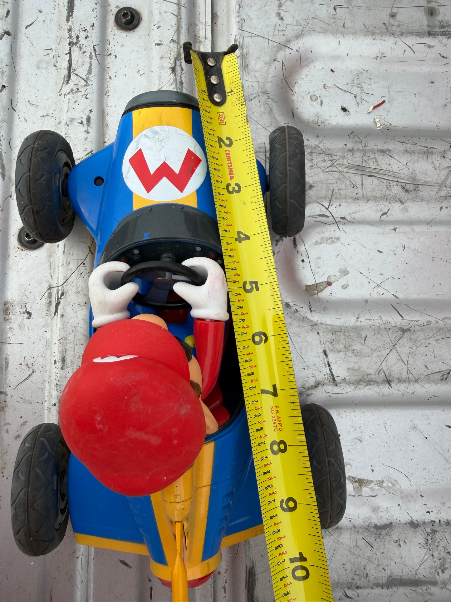 Mario’s car 10 inches long driving Mario’s cart. No battery…
