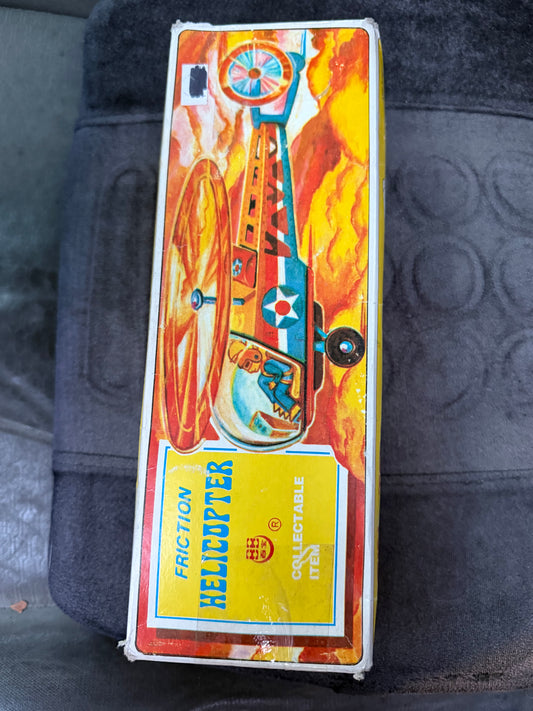 Vintage tin helicopter friction control from wheels still in box …
