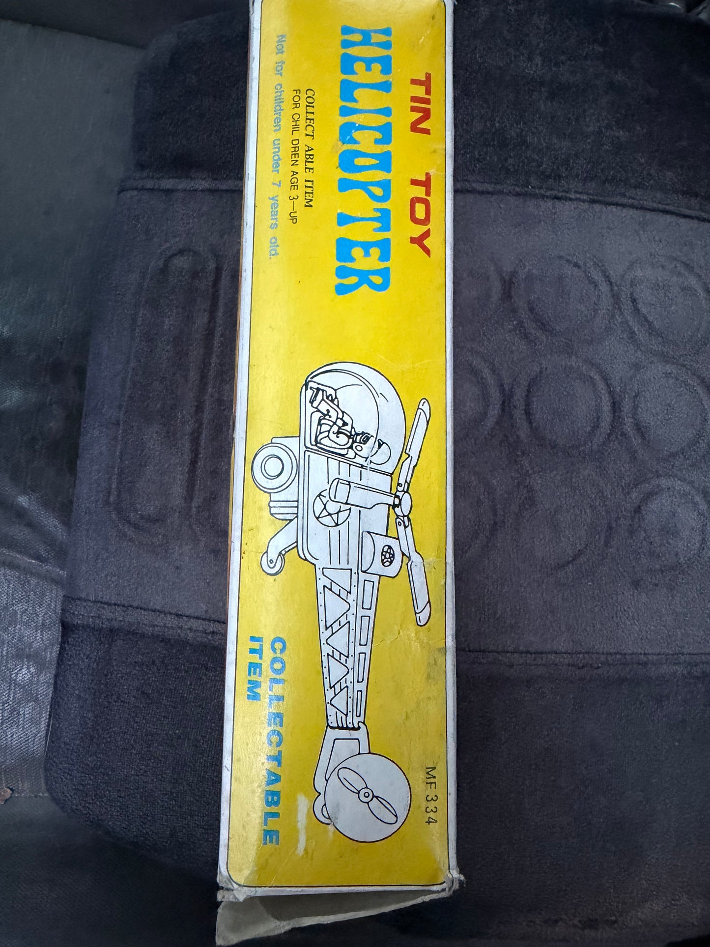 Vintage tin helicopter friction control from wheels still in box …