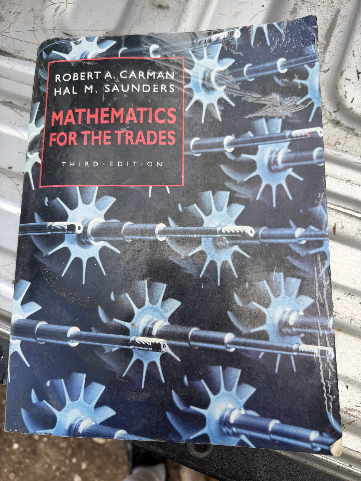 Mathematics for the Trades College work book by Robert A  Carman  and Hal M. Saunders 3 rd edition ….