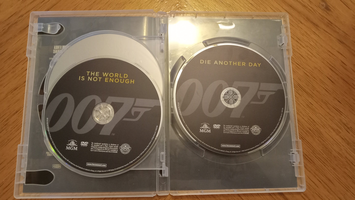 DVD James Bond Pierce Brosnan Ultimate Edition Goldeneye, World Is Not Enough, Die Another Day 007 Rated PG-13 USED